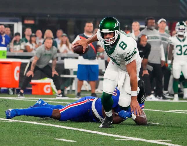 Sep 11, 2023; East Rutherford, New Jersey, USA; Buffalo Bills defensive end Greg Rousseau (50) pressures New York Jets quarterback Aaron Rodgers (8) during the first quarter at MetLife Stadium.