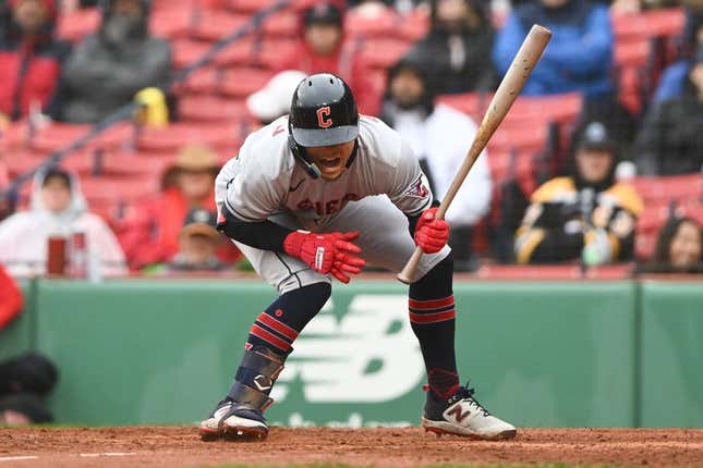 Apr 30, 2023; Boston, Massachusetts, USA; Cleveland Guardians second baseman Andres Gimenez (0) is hit by a pitch thrown by Boston Red Sox starting pitcher Chris Sale (41) during the fifth inning at Fenway Park.