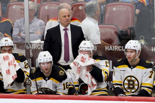 Apr 21, 2023; Sunrise, Florida, USA; Boston Bruins head coach Jim Montgomery looks on from the bench during the third period against the Florida Panthers in game three of the first round of the 2023 Stanley Cup Playoffs at FLA Live Arena.