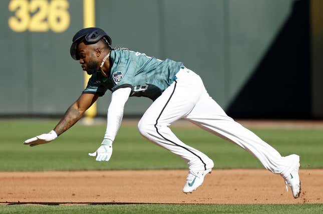 Jul 11, 2023; Seattle, Washington, USA; American League left fielder Randy Arozarena of the Tampa Bay Rays (56) attempts to steal second base during the first inning of the 2023 MLB All Star Game at T-Mobile Park.