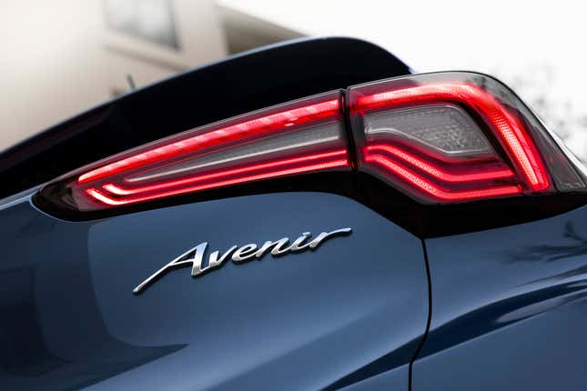 A blue 2024 Buick Encore GX Avenir.