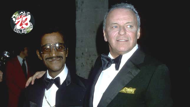 Rat Pack members Frank Sinatra and Sammy Davis, Jr. walk the red carpet at an event in circa 1970.