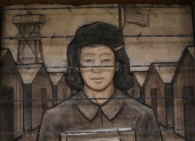A frieze depicts an imprisoned schoolgirl at the Japanese American Exclusion Memorial on Bainbridge Island