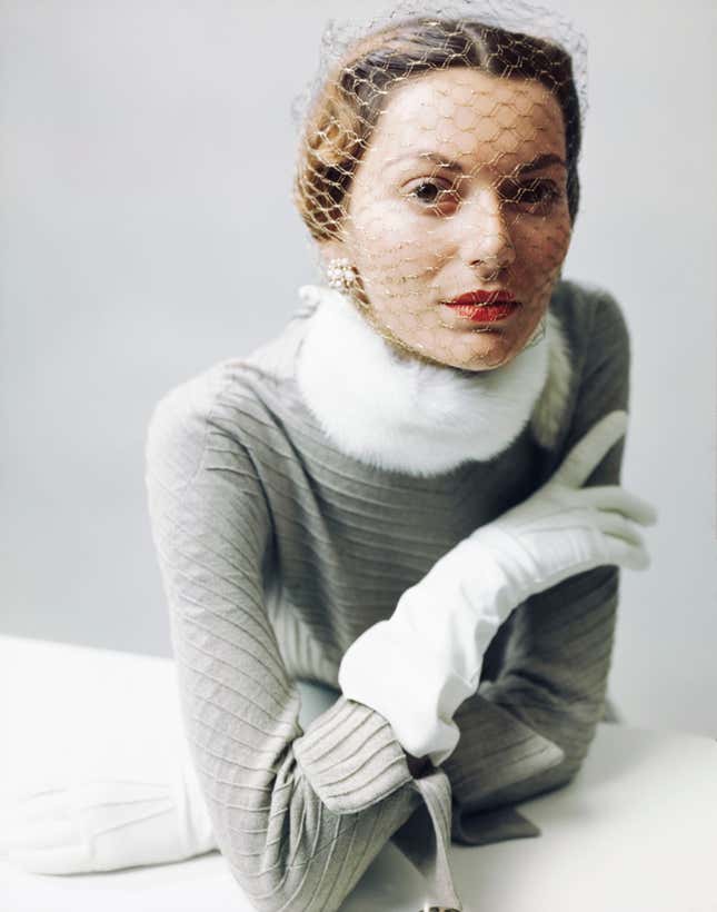 An early color and glamour close-up from 1948. Ahern says there were originally, alternate versions of this frame they considered for the Collection. But the directness of the model’s look—something almost challenging—kept them looking back.