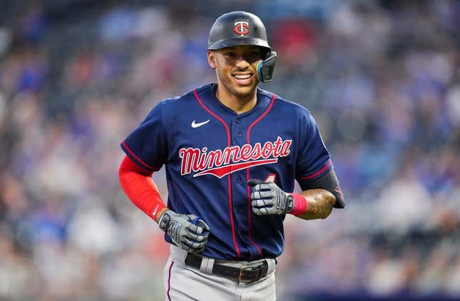 Sep 20, 2022; Kansas City, Missouri, USA; Minnesota Twins shortstop Carlos Correa (4) reacts while running off the field during the first inning against the Kansas City Royals at Kauffman Stadium.