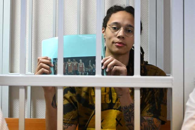 US WNBA basketball superstar Brittney Griner sits inside a defendant’s cage during a hearing at the Khimki Court in the town of Khimki Moscow on July 15, 2022. 
