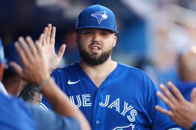 Mar 24, 2023; Dunedin, Florida, USA; Toronto Blue Jays starting pitcher Alek Manoah (6) is congratulated against the Philadelphia Phillies in the second inning during spring training at TD Ballpark.