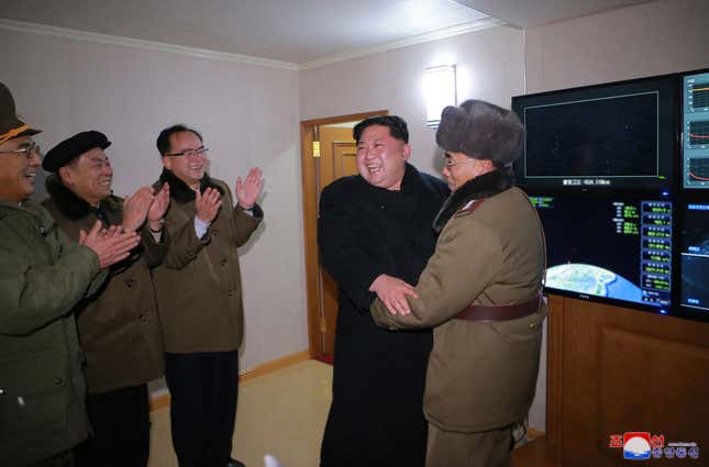 Kim Jong Un reacts to a test of the newly developed inter-continental ballistic rocket Hwasong-15.