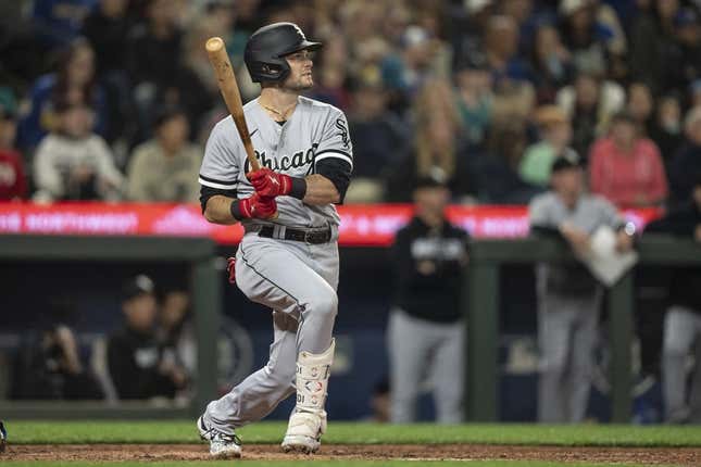 Jun 16, 2023; Seattle, Washington, USA; Chicago White Sox left fielder Andrew Benintendi (23) hits a solo home run off Seattle Mariners starting pitcher Bryan Woo (33) during the sixth inning at T-Mobile Park.