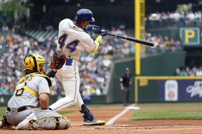 May 28, 2023; Seattle, WA, USA; Seattle Mariners center fielder Julio Rodriguez (44) hits a solo home run against the Pittsburgh Pirates in the first inning at T-Mobile Park.