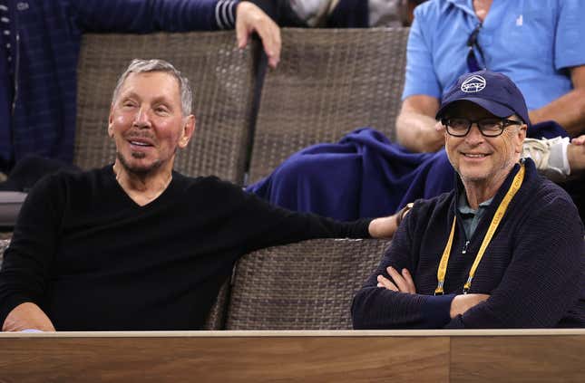Larry Ellison, the founder of Oracle, sits beside his fellow billionaire Bill Gates.