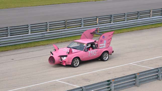 A photo of a pink racer at the 24 Hours Of Lemons event. 