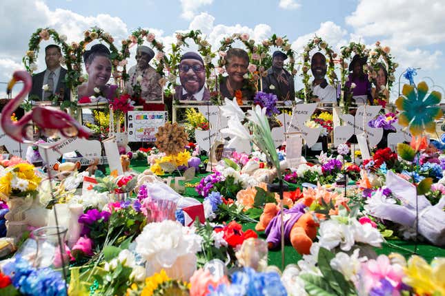 A memorial for the supermarket shooting victims is set up outside the Tops Friendly Market on Thursday, July 14, 2022, in Buffalo, N.Y. N.Y. The Buffalo supermarket where 10 Black people were killed by a white gunman is set to reopen its doors, two months after the racist attack. 

