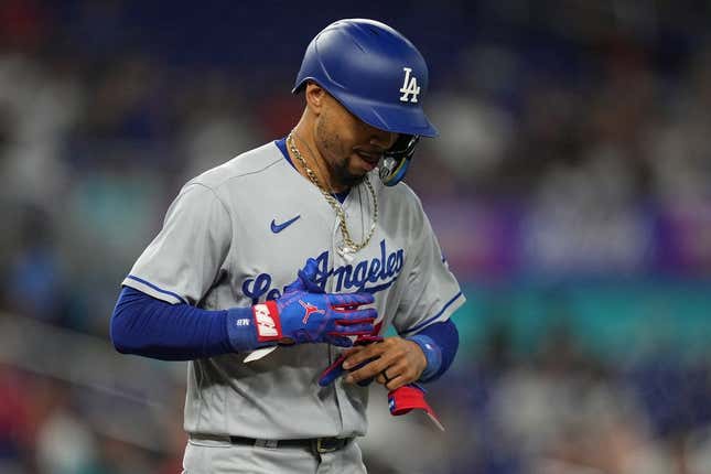 Sep 7, 2023; Miami, Florida, USA; Los Angeles Dodgers right fielder Mookie Betts (50) walks in the first inning against the Miami Marlins at loanDepot Park.