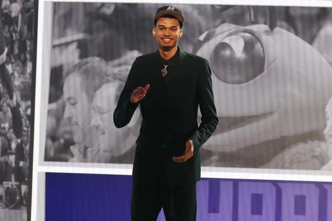 Jun 22, 2023; Brooklyn, NY, USA; Victor Wembanyama reacts after being selected first by the San Antonio Spurs in the first round of the 2023 NBA Draft at Barclays Arena.
