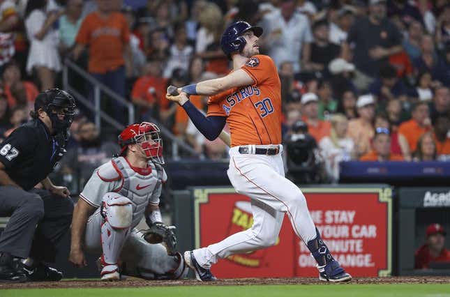Apr 30, 2023; Houston, Texas, USA; Houston Astros right fielder Kyle Tucker (30) drives in a run with a single during the fifth inning against the Philadelphia Phillies at Minute Maid Park.
