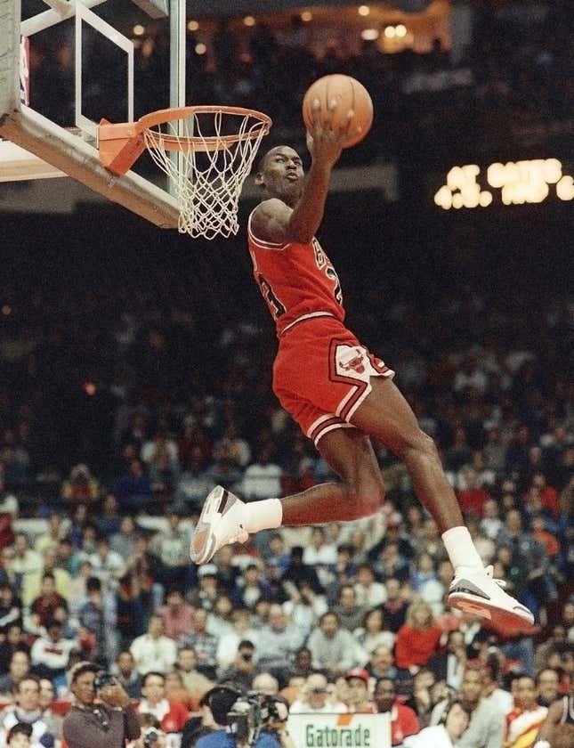  In this Feb. 6, 1988, file photo, Chicago Bulls’ Michael Jordan dunks the ball during the Slam-Dunk championship in Chicago, as a part of the NBA All-Star weekend.