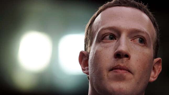 A close up shot of Zuckerberg looking not so happy. 