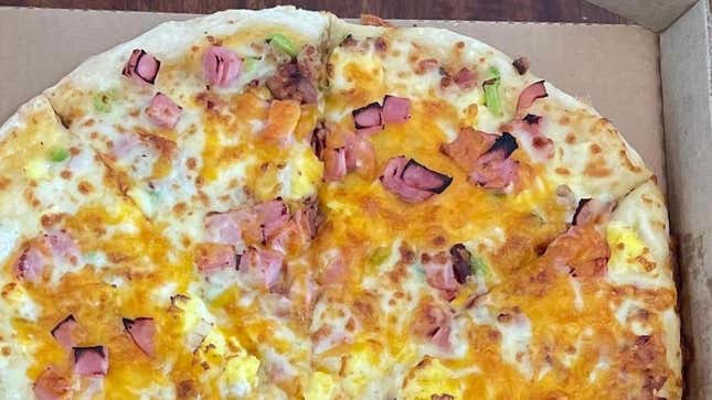 Image for article titled Casey’s New Beer Cheese Breakfast Pizza Is Glorious Midwestern Excess