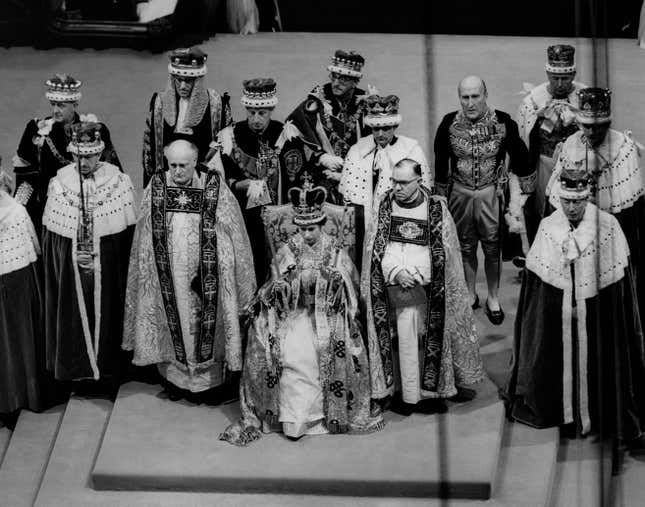 Britain's Queen Elizabeth II sits on a throne during her coronation in Westminster Abbey in London.
