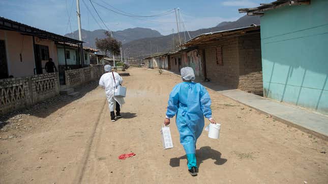 Health workers travel the district of Buenos Aires, Morropon Province, in Piura, north of Peru, to vaccinate people with the AstraZeneca/Oxford vaccine on October 18, 2021.