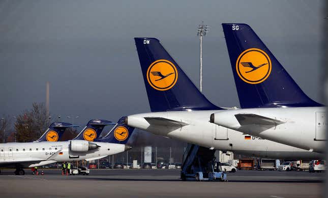 Planes stand on the tarmac during a pilots strike of German airline Lufthansa at Munich airport