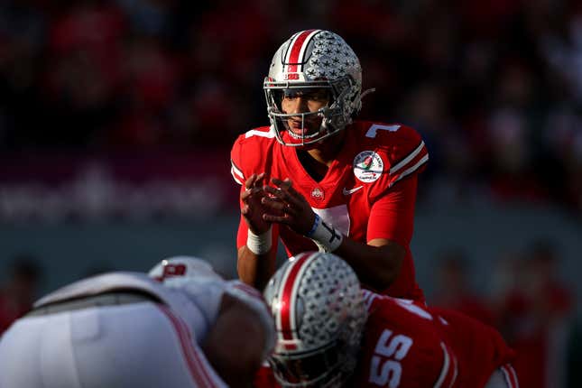 C.J. Stroud of the Ohio State Buckeyes awaits the snap against the Utah Utes during the first half of the Rose Bowl game in January.