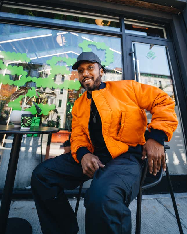 Brooklyn-based artist, Christophe Roberts in front of SEED Brklyn