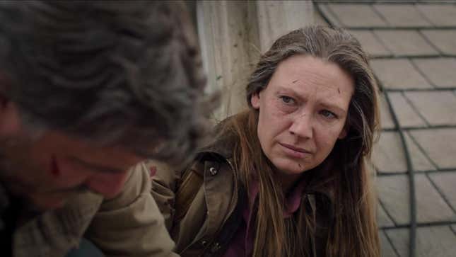 Anna Torv as Tess looks at Pedro Pascal's Joel in episode 2 of HBO's The Last of Us. 
