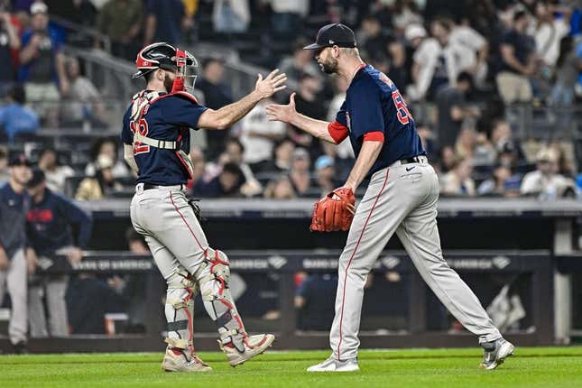 Jun 11, 2023; Bronx, New York, USA; Boston Red Sox catcher Connor Wong (12) and relief pitcher Chris Martin (55) react after defeating the New York Yankees at Yankee Stadium.