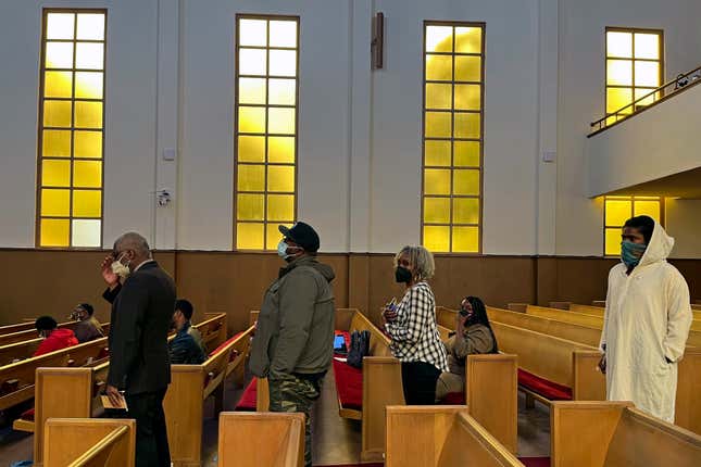 People line up to speak during a reparations task force meeting at Third Baptist Church in San Francisco, Wednesday, April 13, 2022.