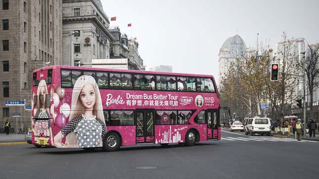 A photo of a pink Barbie bus in China. 