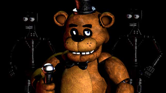 An animatronic teddy bear with a top hat stands in front of skinless animatronic bones.