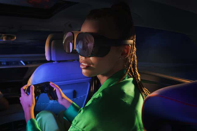 A woman using Holoride in a car