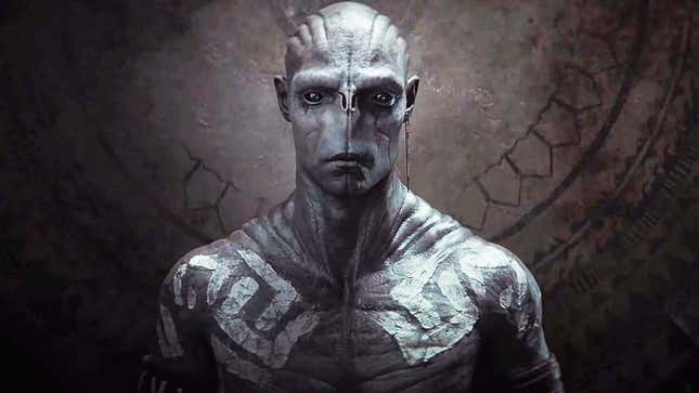 A strange looking humanoid alien with grey skin and white markings all over its body. 