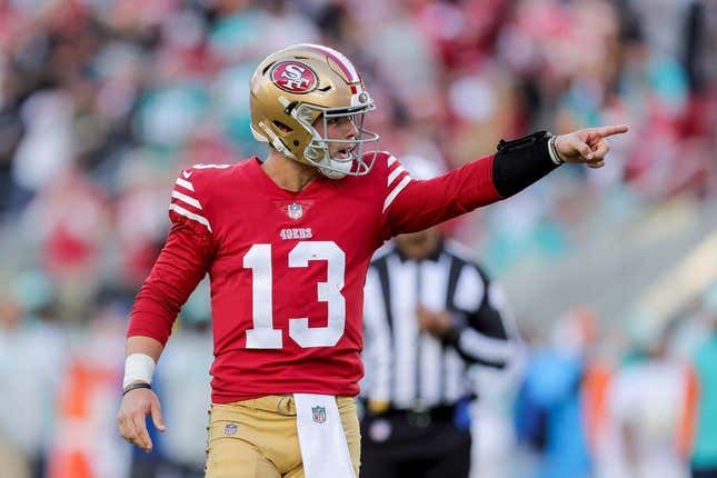 Dec 4, 2022; Santa Clara, California, USA; San Francisco 49ers quarterback Brock Purdy (13) celebrates after throwing a touchdown pass during the second quarter against the Miami Dolphins at Levi&#39;s Stadium.