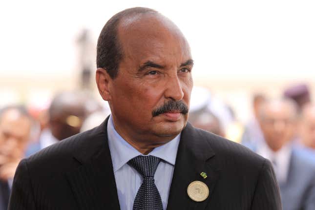 Mauritania's President Mohamed Ould Abdel Aziz waits for the arrival of the French President at Nouakchott airport, Mauritania, July 2, 2018. Macron, making an exceptional appearance at an African Union (AU) summit, was expected to discuss hurdles facing a five-nation French-backed anti-terror unit, the "G5 Sahel" force.