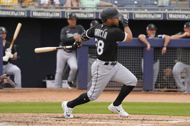 Mar 11, 2023; Peoria, Arizona, USA; Chicago White Sox second baseman Leury Garcia (28) hits against the San Diego Padres in the third inning at Peoria Sports Complex.
