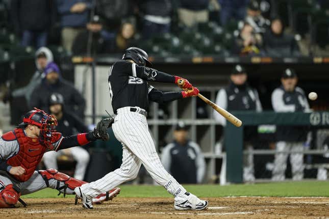 May 2, 2023; Chicago, Illinois, USA; Chicago White Sox left fielder Andrew Benintendi (23) hits a walk-off single against the Minnesota Twins during the 10th inning at Guaranteed Rate Field.