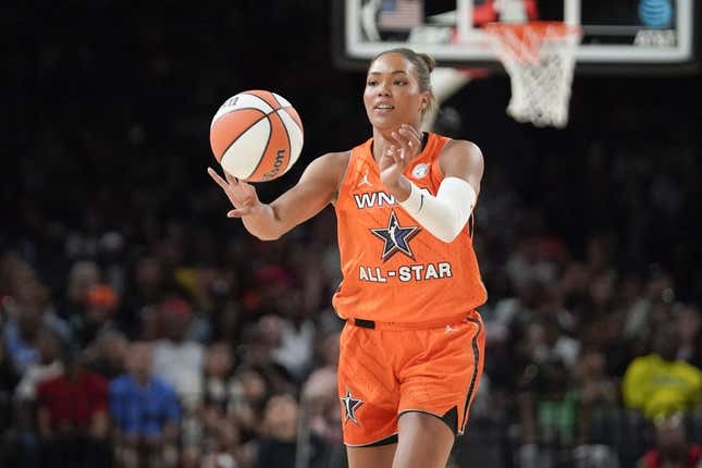 Jul 15, 2023; Las Vegas, NV, USA; Team Stewart frontcourt Napheesa Collier (24) passes the ball against Team Wilson during the first half in the 2023 WNBA All-Star Game at Michelob Ultra Arena.