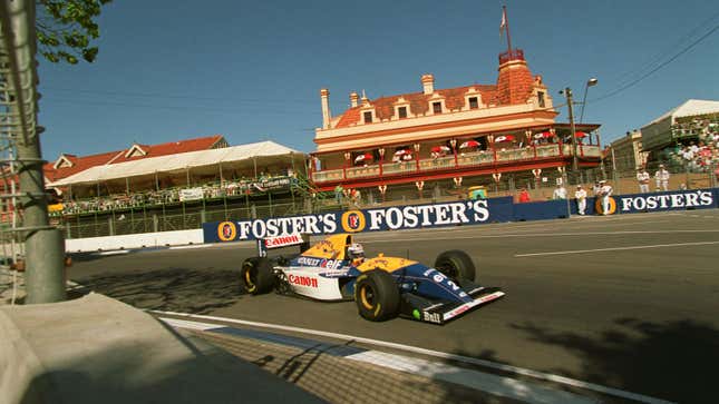 A photo of a yellow, blue and white Williams Formula 1 car. 