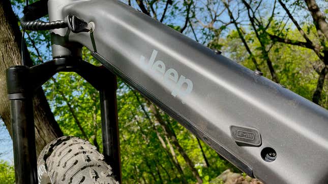 A photo of the charging port and key in the Jeep e-bike.