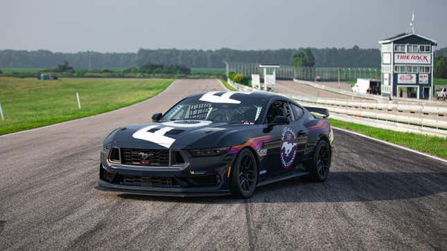 Ford Mustang Dark Horse R parked slanted across the track at gingerman raceway