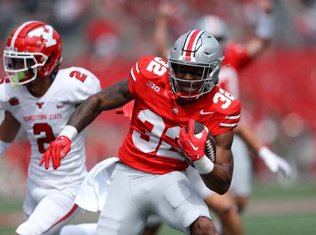 Sep 9, 2023; Columbus, Ohio, USA; Ohio State Buckeyes running back TreVeyon Henderson (32) ryuns for the touchdown during the second quarter against the Youngstown State Penguins at Ohio Stadium.