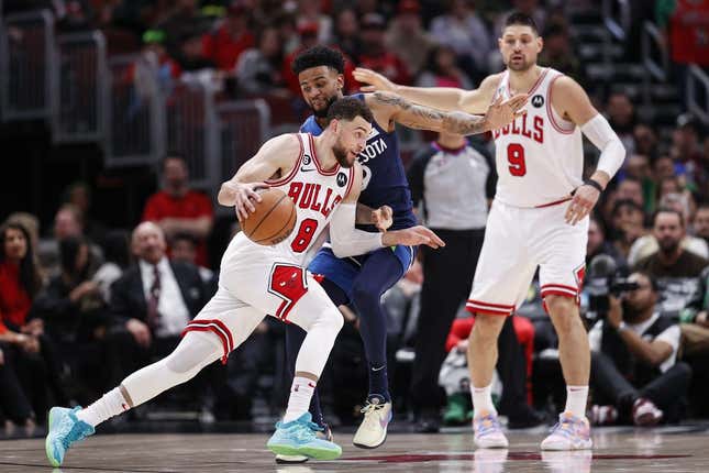 Mar 17, 2023; Chicago, Illinois, USA; Chicago Bulls guard Zach LaVine (8) drives to the basket against Minnesota Timberwolves guard Nickeil Alexander-Walker (9) during the second half at United Center.