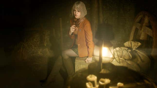 Ashley Graham sits in a dark room.