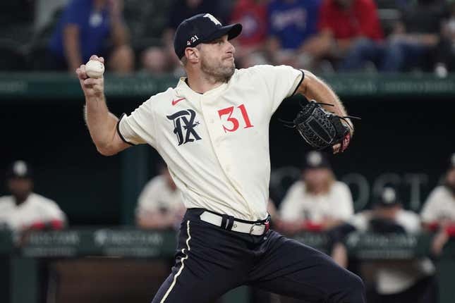 Sep 1, 2023; Arlington, Texas, USA; Texas Rangers starting pitcher Max Scherzer (31) throws to the plate during the first inning against the Minnesota Twins at Globe Life Field.