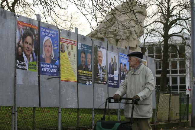 Campaign posters of candidates in Nord-Pas-de-Calais-Picardie region of France.