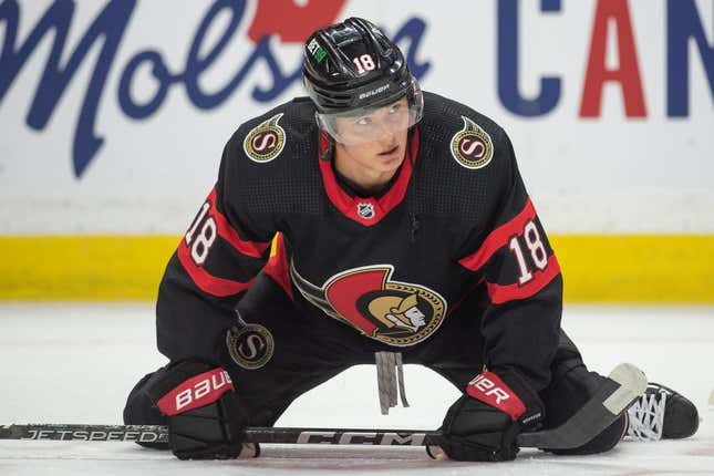 Feb 13, 2023; Ottawa, Ontario, CAN; Ottawa Senators left wing Tim Stutzle (18) stretches during warmup prior to game against the Calgary Flames at the Canadian Tire Centre.