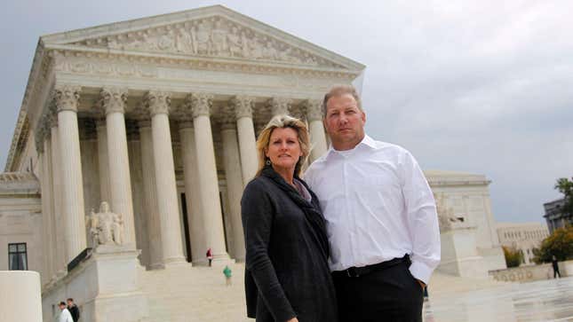 The landowners at the center of this case, Mike and Chantell Sackett, pose in front of the Supreme Court in 2011.